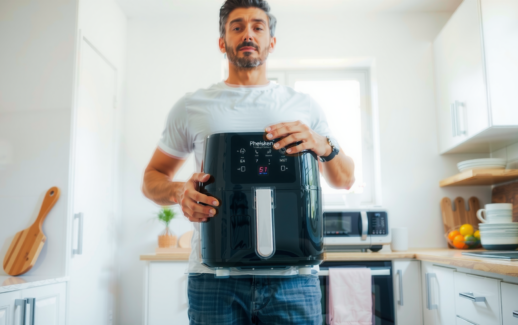 Ninja MAX Dual Zone Air Fryer — lifestyle photo showing Ninja MAX Dual Zone in use