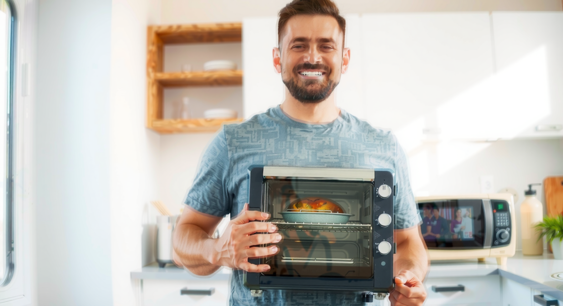 Chefman 5-in-1 Air Fryer Oven UK — lifestyle photo showing Chefman 5-in-1 Air Fryer in use