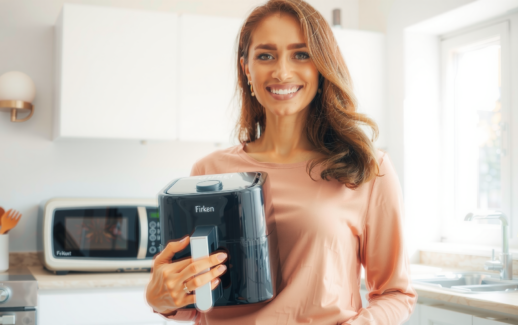 Ninja AF180UK Air Fryer review — lifestyle photo showing Ninja Air Fryer MAX in use